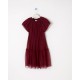 Drop waist dress with cap sleeves and a sparkling tulle overlay.