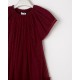 Drop waist dress with cap sleeves and a sparkling tulle overlay.